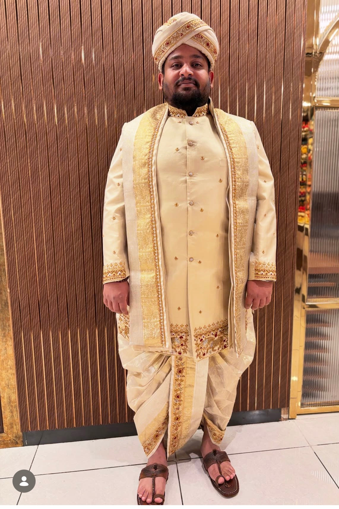 Royal Champagne Gold Sherwani, Dhoti, and Peta Groom Ensemble with Zardozi Embroidery | Client Spotlight