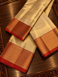 Luminous Off-White Tissue Silk Traditional Dhothi Ensemble with Contrast Crimson Red Zari Border