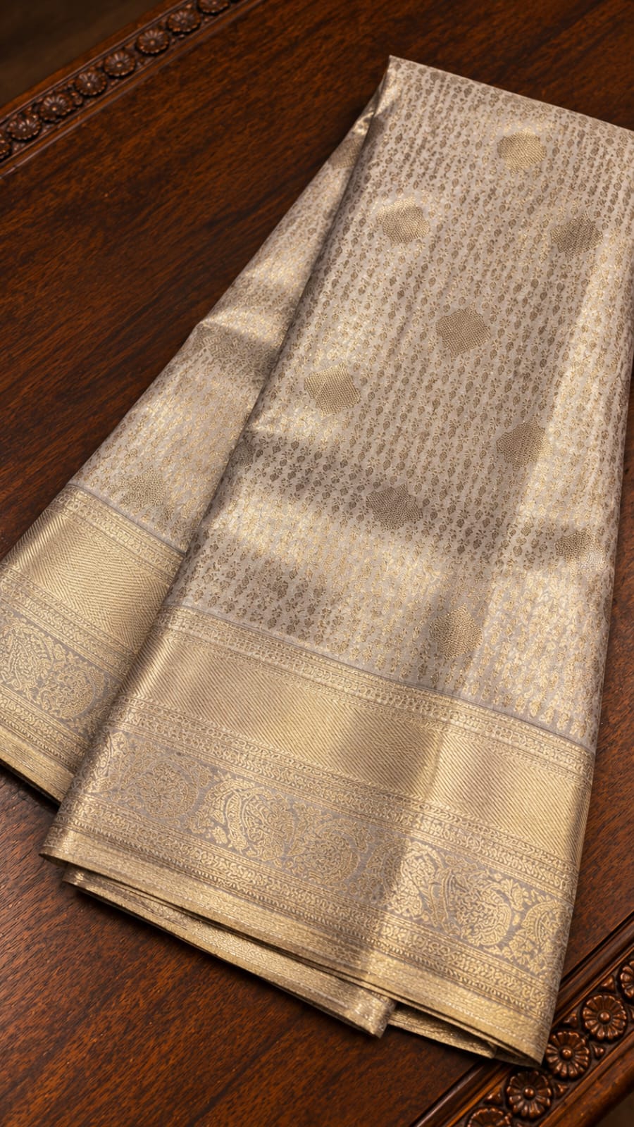 Off-White Silver Tissue Silk Saree with Gold Zari Butis & Border