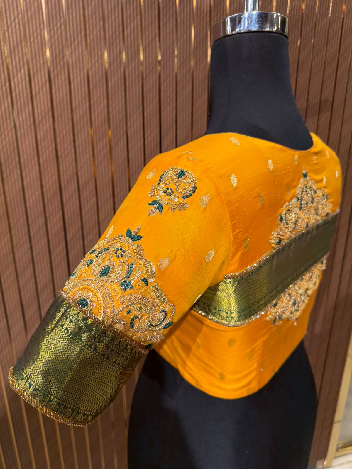 Vibrant Mustard Yellow Silk Designer Blouse with Contrasting Green Kanjeevaram Brocade Border and Zardozi Work