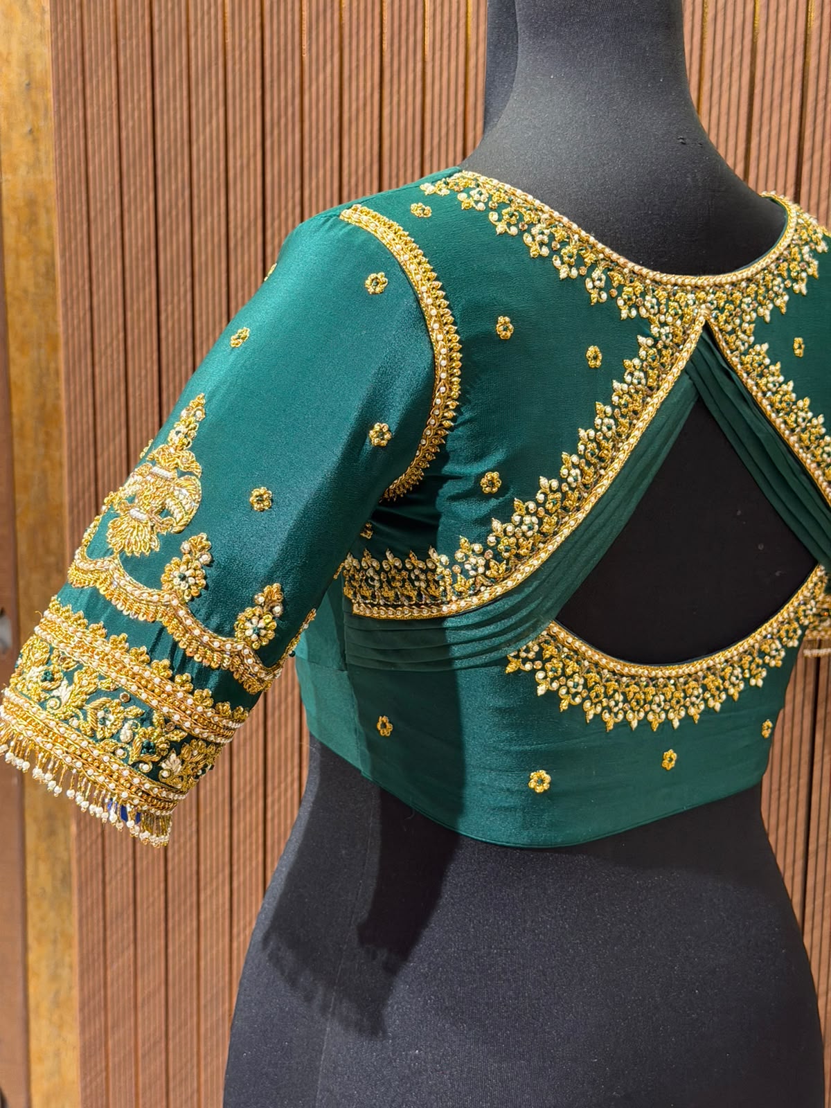 Regal Emerald Green Silk Designer Blouse with Intricate Gold Zardozi Hand-Embroidery and Pearl Detailing