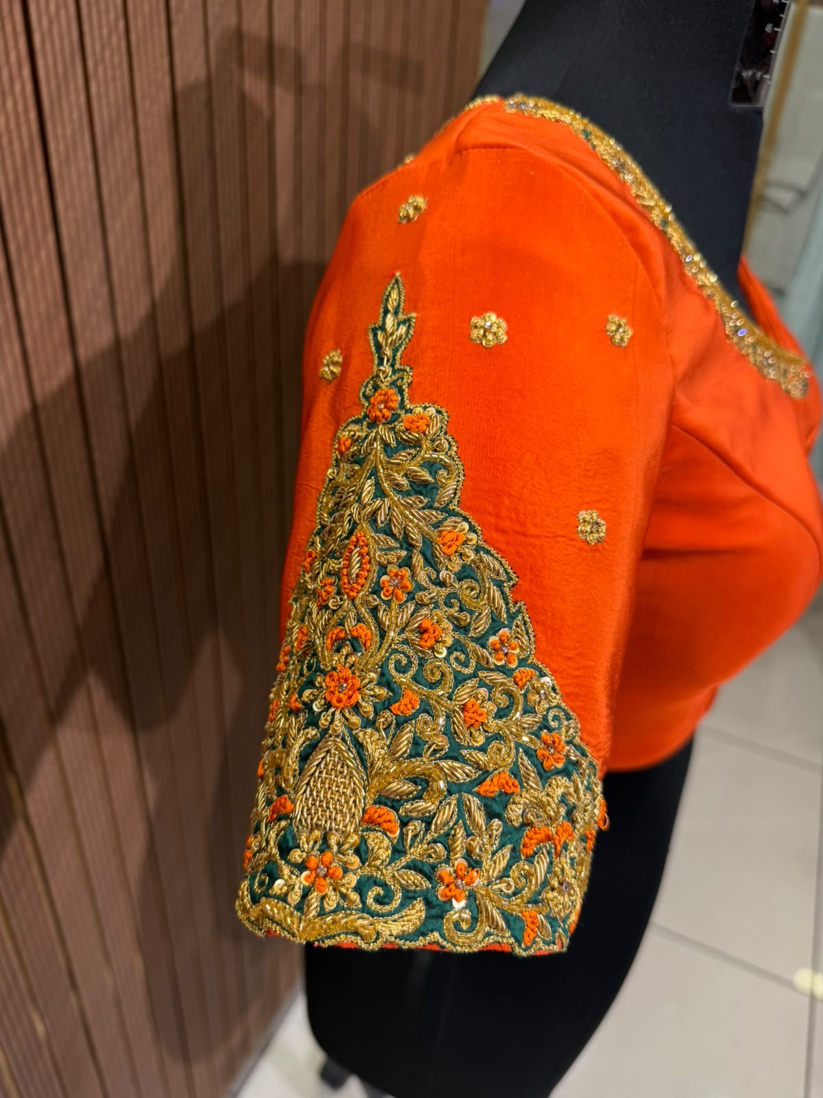 Vibrant Orange Raw Silk Designer Blouse with Zardozi Work and Cut-Out Back