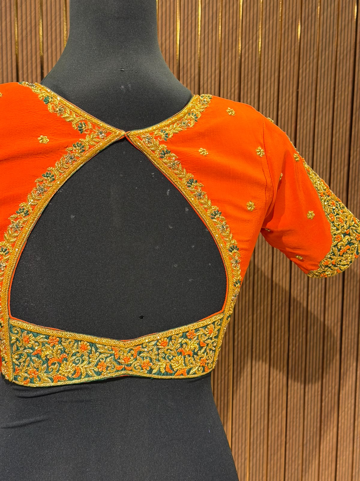 Vibrant Orange Raw Silk Designer Blouse with Zardozi Work and Cut-Out Back