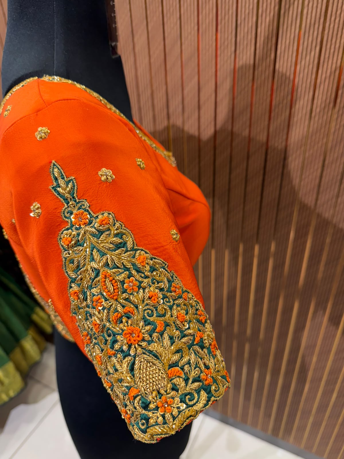 Vibrant Orange Raw Silk Designer Blouse with Zardozi Work and Cut-Out Back