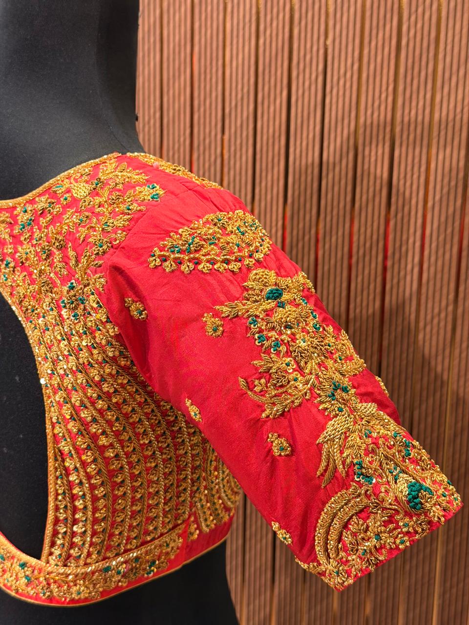Vibrant Tangerine Orange Hand-Embroidered Designer Blouse with Zardozi and Pearl Work