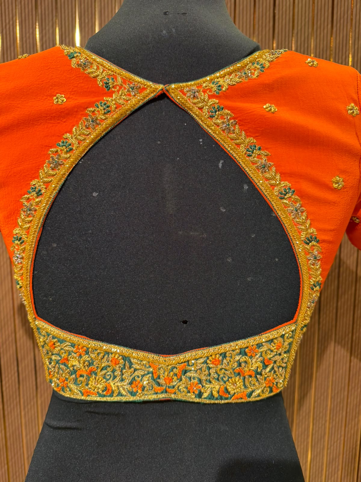 Vibrant Orange Raw Silk Designer Blouse with Zardozi Work and Cut-Out Back