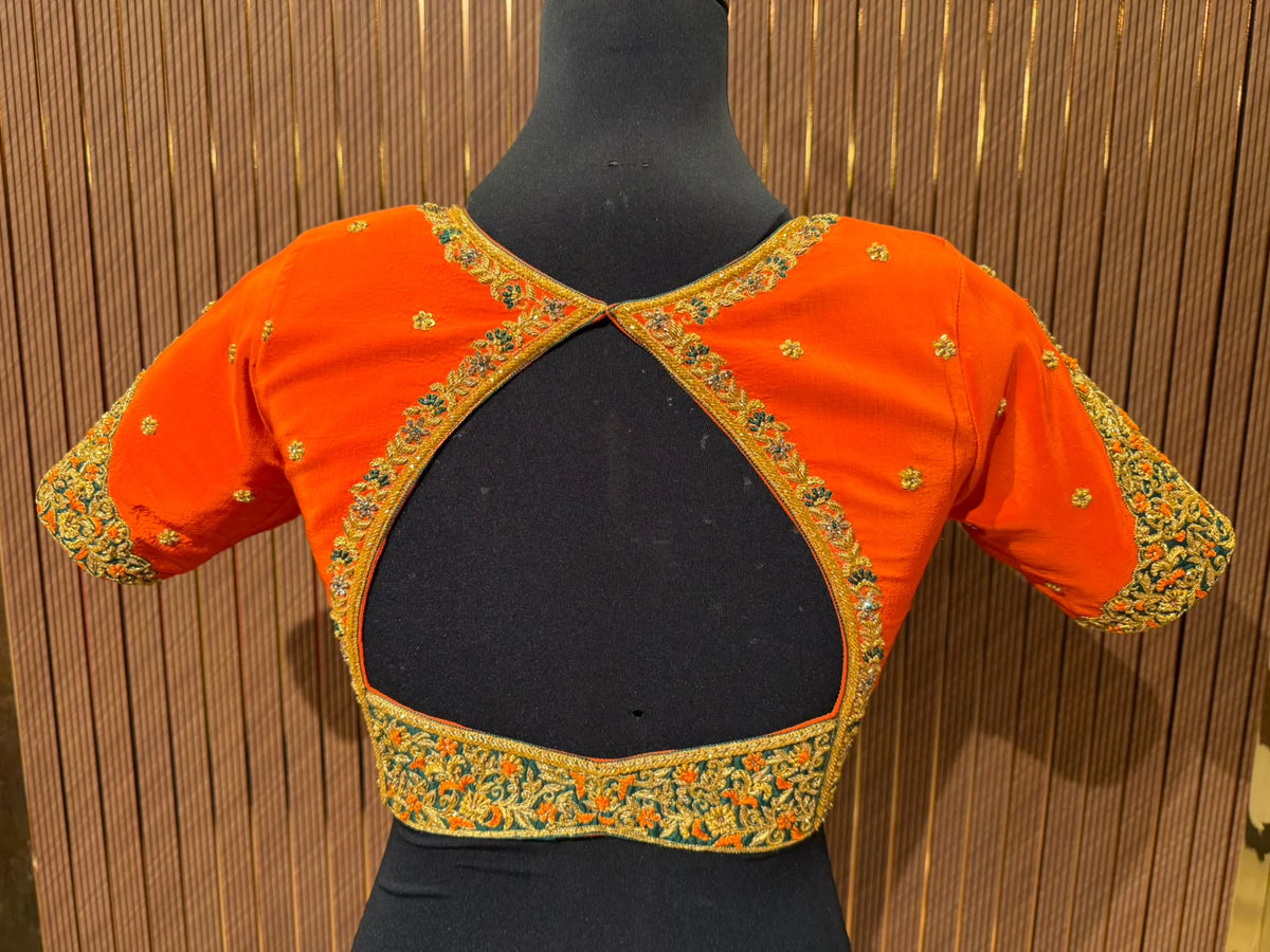 Vibrant Orange Raw Silk Designer Blouse with Zardozi Work and Cut-Out Back