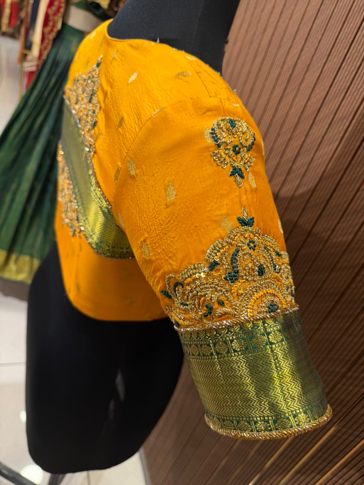 Vibrant Mustard Yellow Silk Designer Blouse with Contrasting Green Kanjeevaram Brocade Border and Zardozi Work