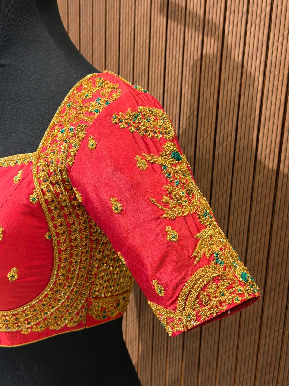 Vibrant Tangerine Orange Hand-Embroidered Designer Blouse with Zardozi and Pearl Work