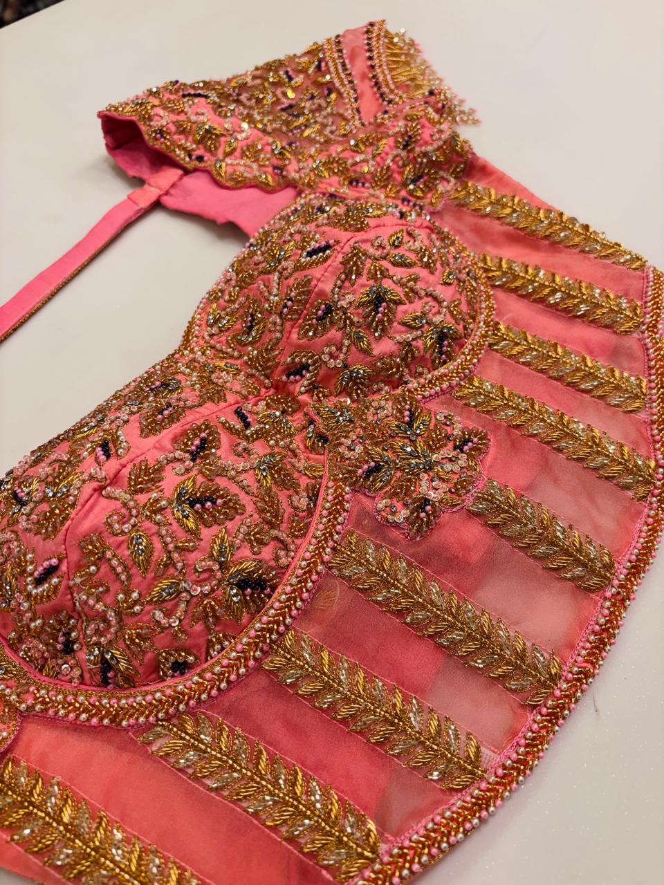 Coral Pink Designer Blouse with Pleated Sheer Panels, Zardozi, and Pearl Hand-Embroidery
