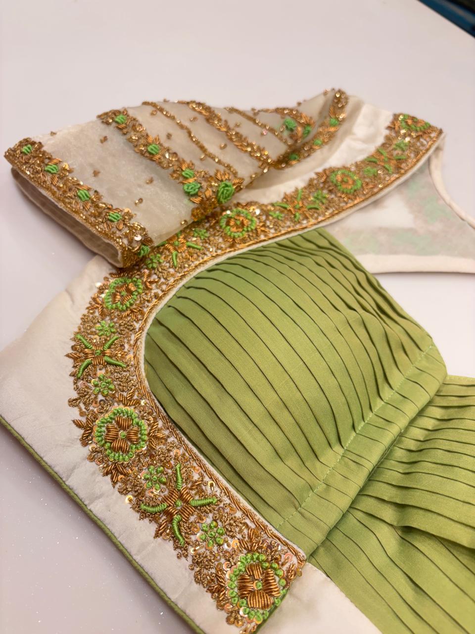 Elegant Ivory and Olive Green Pleated Designer Blouse with Zardozi and Thread Hand-Embroidery