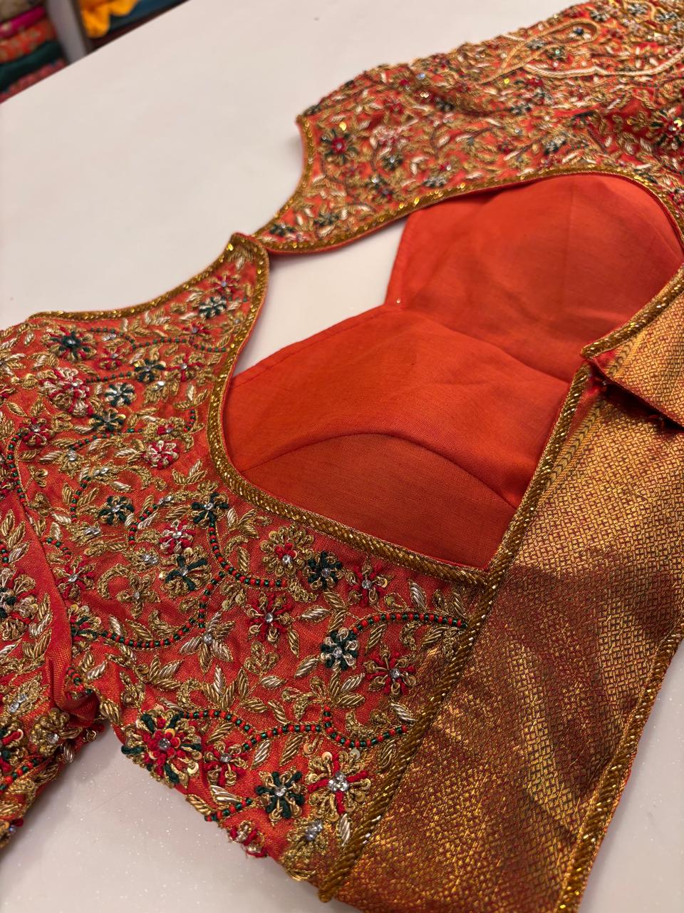 Opulent Vermilion Red Designer Blouse with Pleated Bodice and Heavy Zardozi Hand-Embroidery