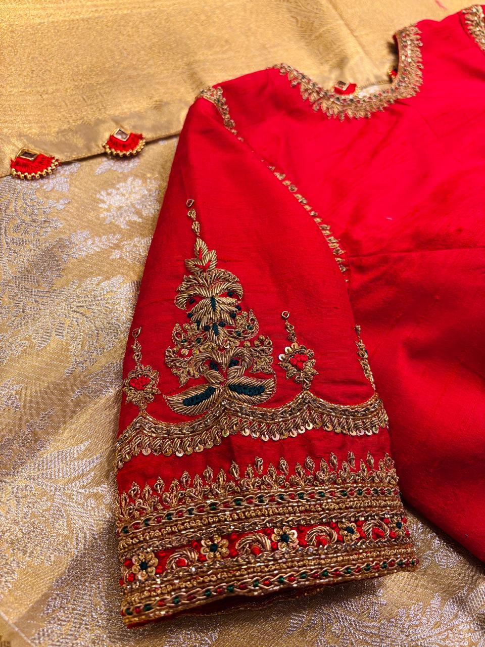 Opulent Crimson Red Designer Silk Blouse with Intricate Zardozi and Stone Hand-Embroidery