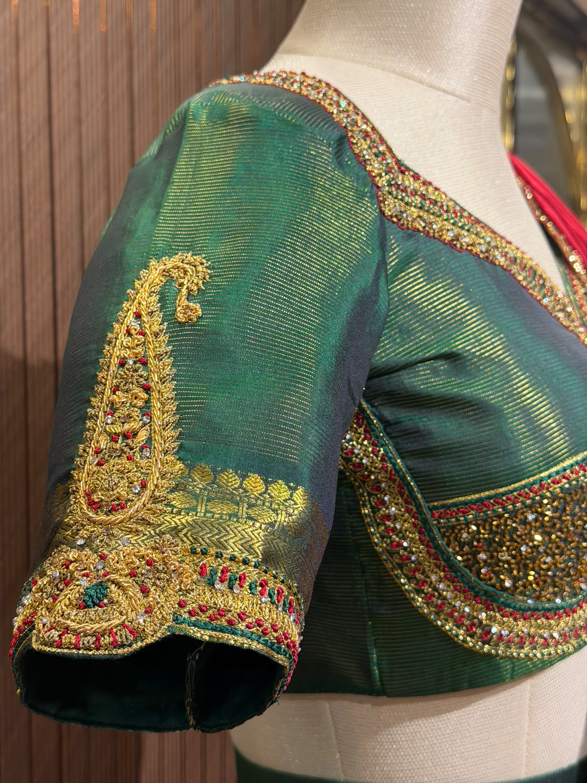 Regal Emerald Green Silk Designer Blouse with Intricate Gold Zardozi Hand-Embroidery and Pearl Detailing