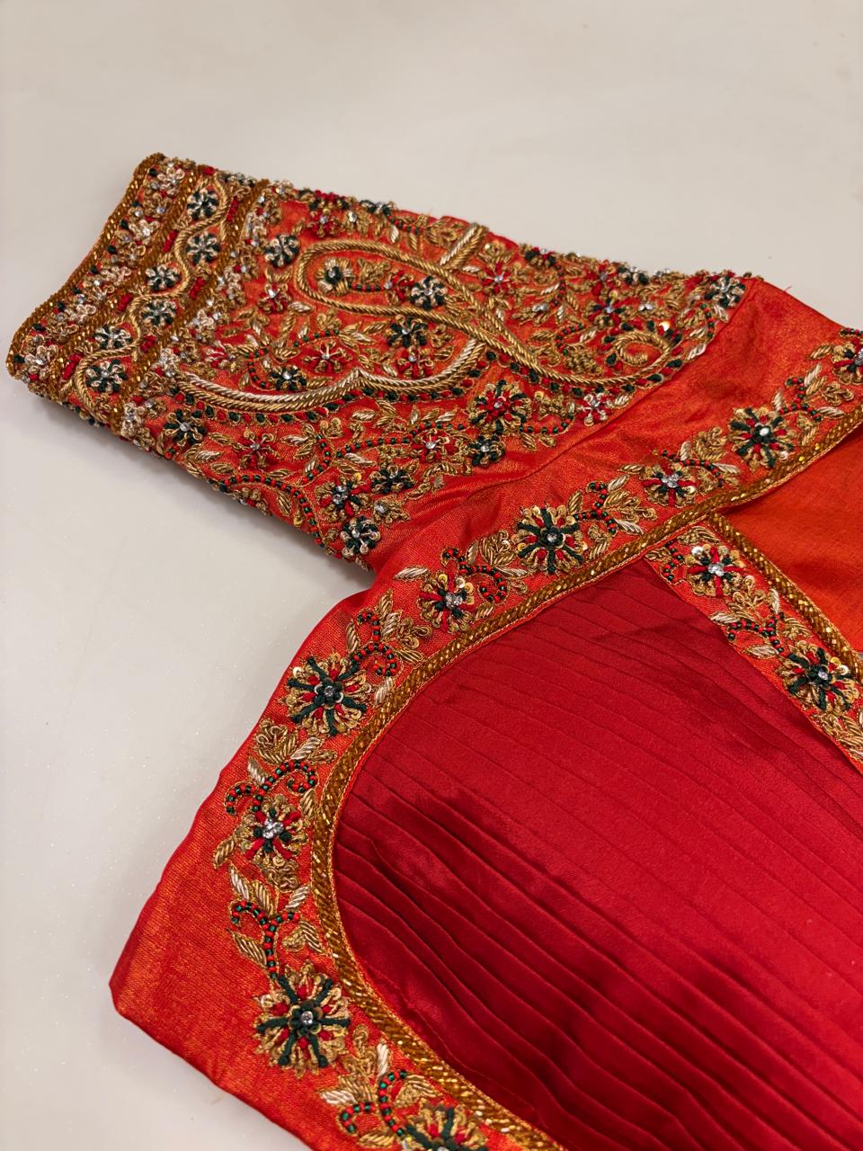 Opulent Vermilion Red Designer Blouse with Pleated Bodice and Heavy Zardozi Hand-Embroidery