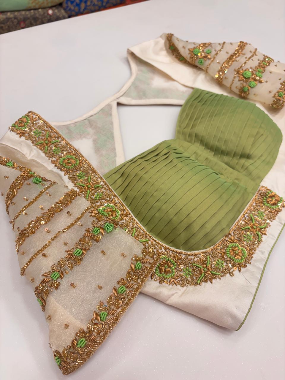 Elegant Ivory and Olive Green Pleated Designer Blouse with Zardozi and Thread Hand-Embroidery