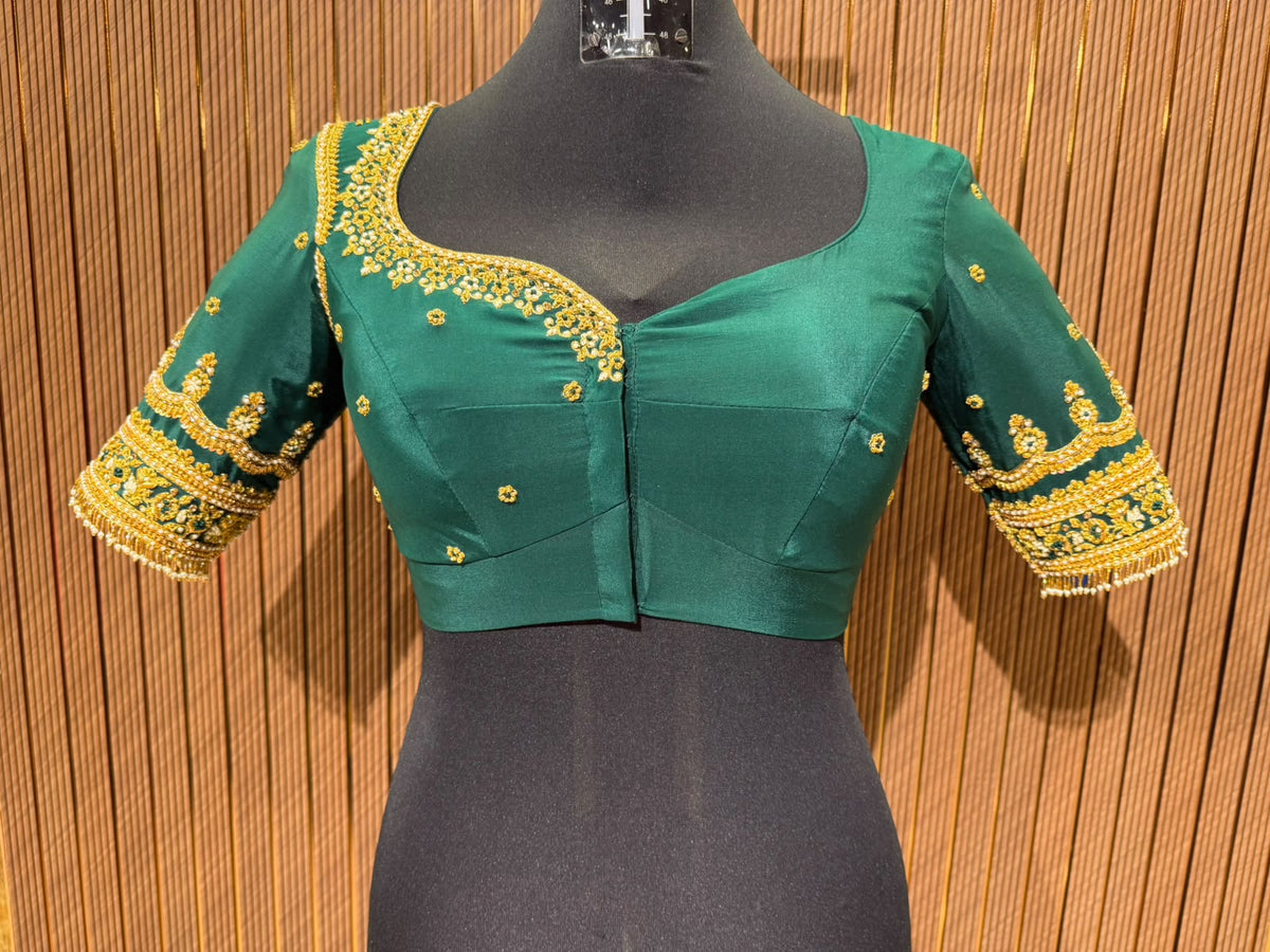 Regal Emerald Green Silk Designer Blouse with Intricate Gold Zardozi Hand-Embroidery and Pearl Detailing