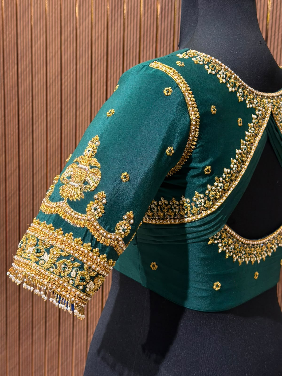 Regal Emerald Green Silk Designer Blouse with Intricate Gold Zardozi Hand-Embroidery and Pearl Detailing