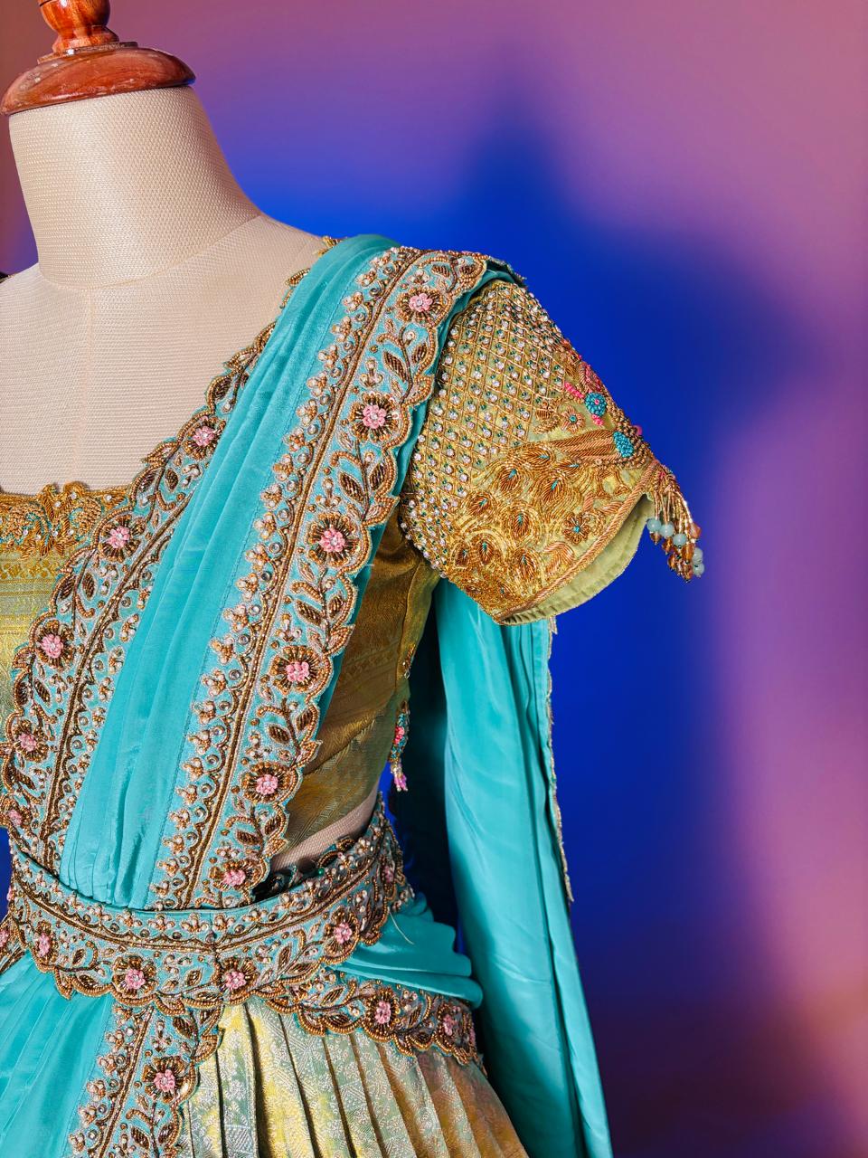Opulent Gold and Turquoise Langa Voni Set with Intricate Zardozi and Floral Hand-Embroidery