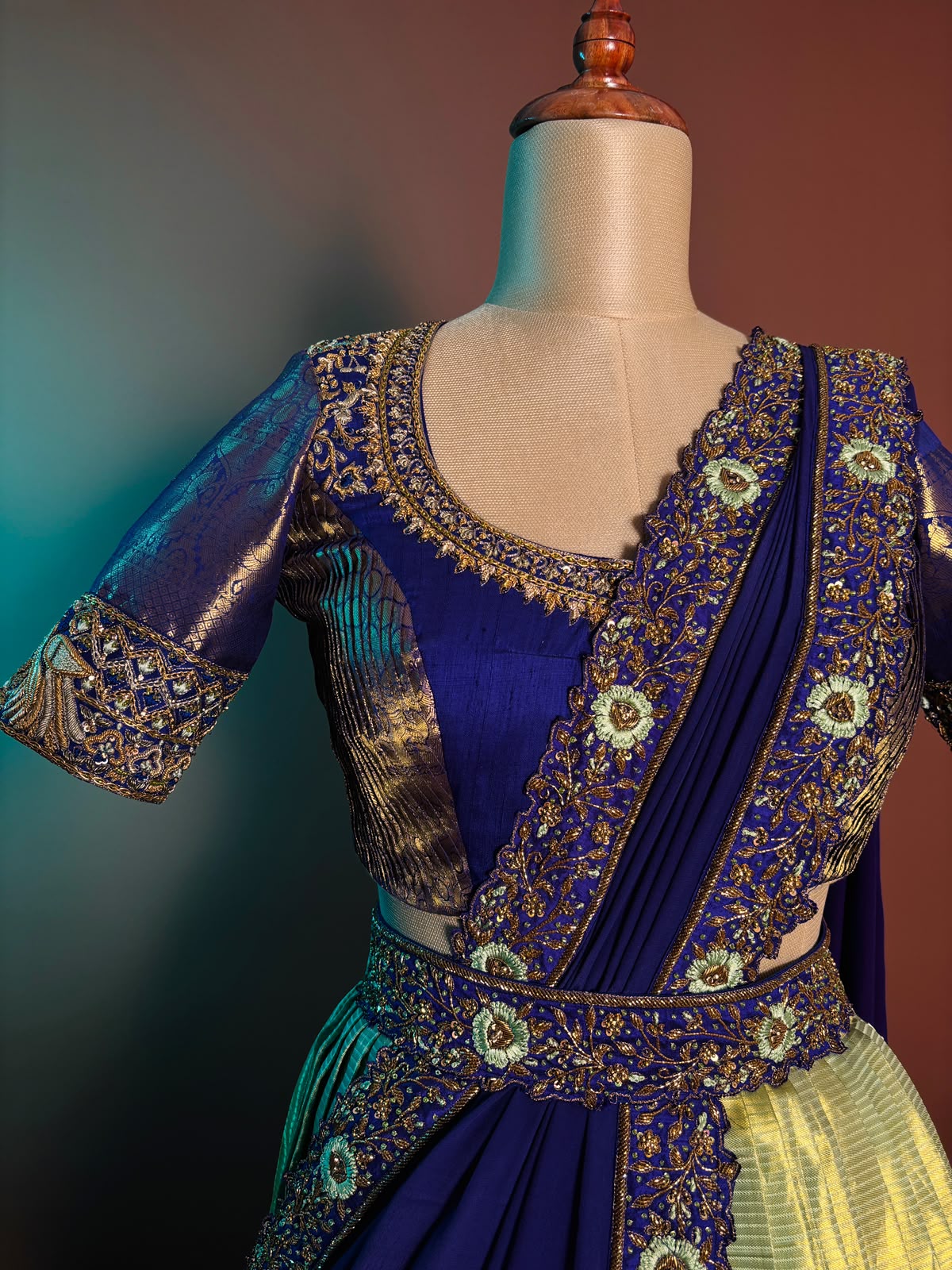 Majestic Royal Blue and Gold Pleated Langa Voni Set with Hand-Embroidered Zardozi and Floral Motifs
