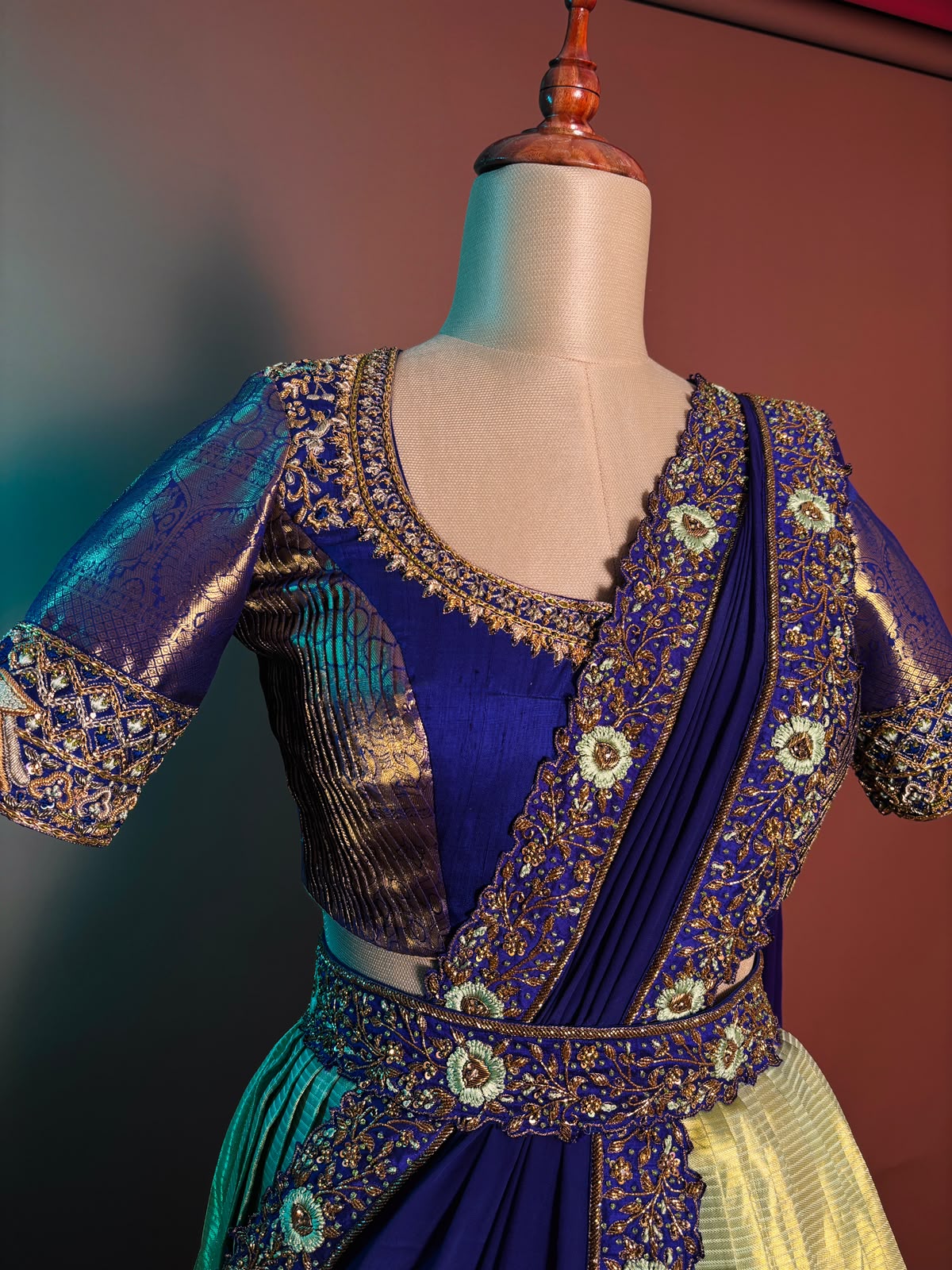 Majestic Royal Blue and Gold Pleated Langa Voni Set with Hand-Embroidered Zardozi and Floral Motifs