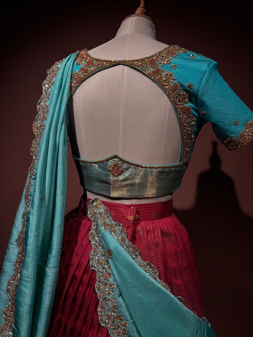 Regal Maroon and Turquoise Brocade Langa Voni Set with Intricate Zardozi and Sequin Embroidery