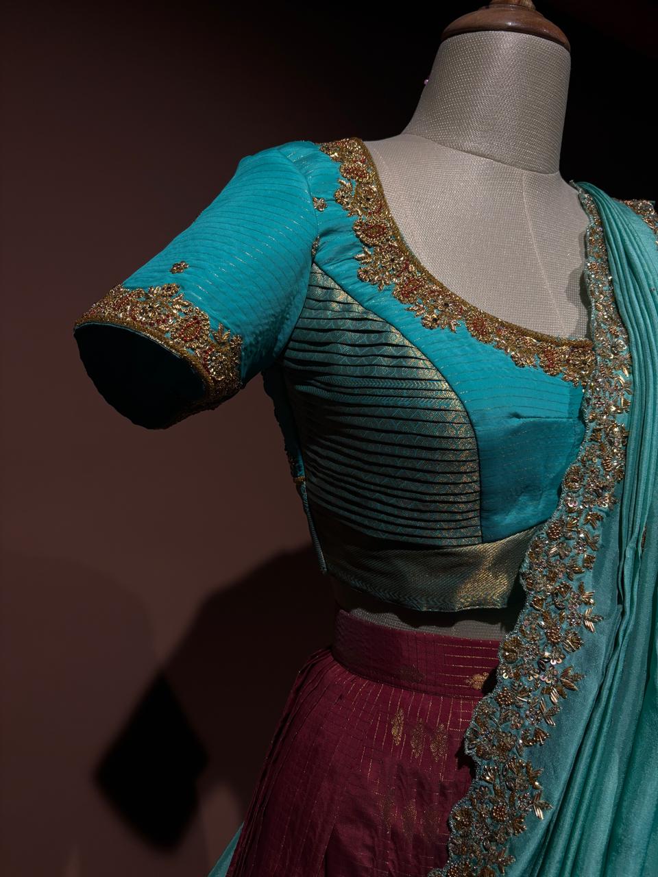 Regal Maroon and Turquoise Brocade Langa Voni Set with Intricate Zardozi and Sequin Embroidery